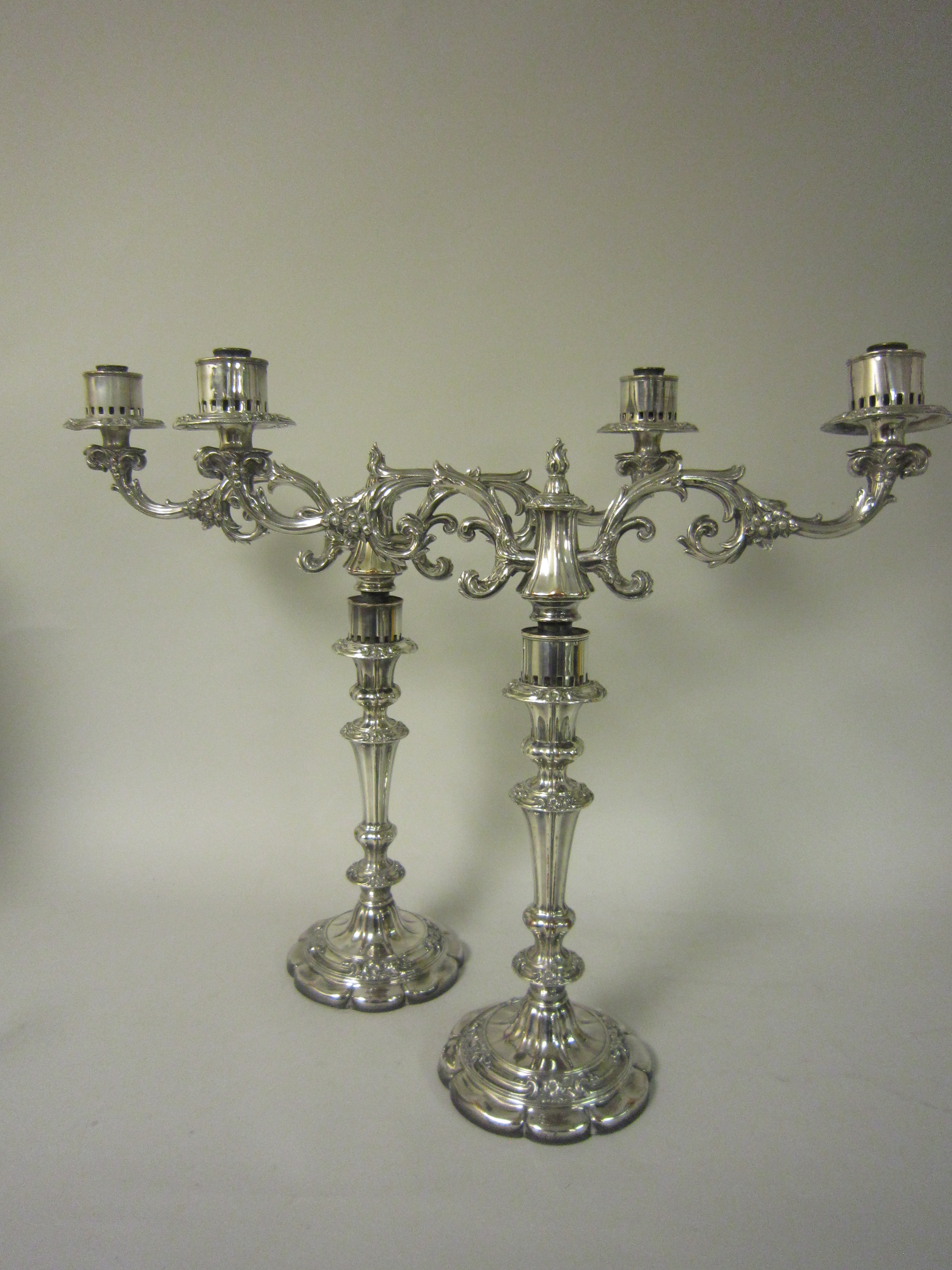 Pair of 19th Century plated Candelabra with floral and leafage scroll branches, tapering columns