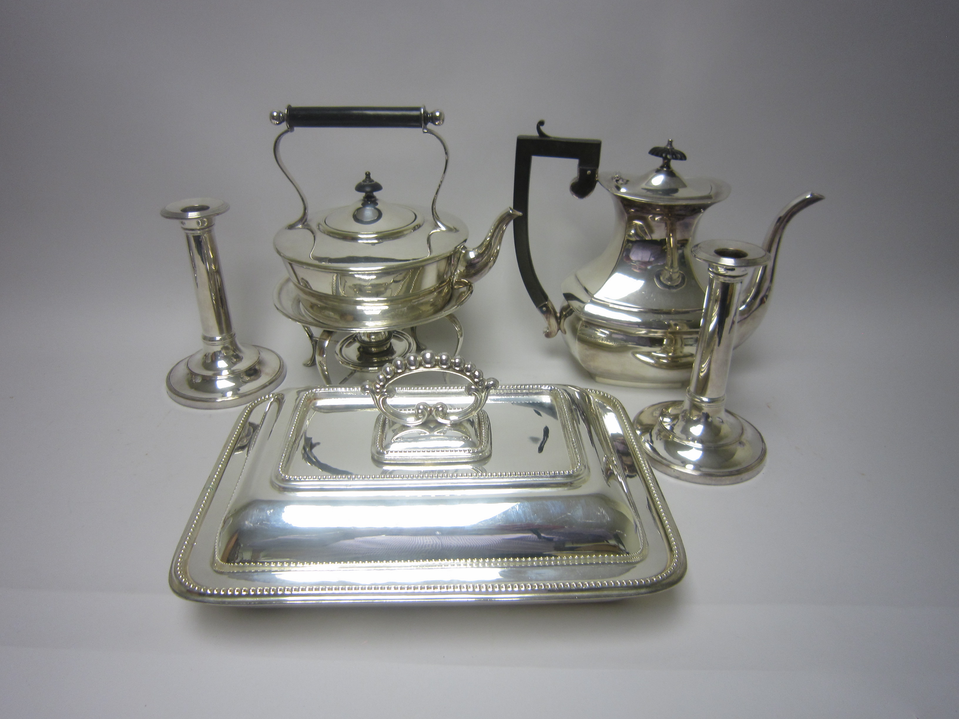 Plated Items: Entree Dish and Cover, pair of Candlesticks, Tea Kettle on Stand, Teapot, Coffee