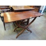 A 19th century mahogany folding Coaching Table on shaped supports with turned stretchers, 2ft 11in