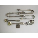A George III silver plain Caddy Spoon, London 1810, maker: J.S, two William IV silver Salt Spoons
