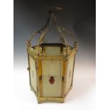 A mid 19th Century hexagonal Lantern with original painted and etched glass panels and pierced and