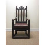 An antique oak Armchair with scrolled top rail, slatted back, upholstered seat on square supports