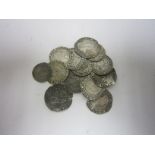 A collection of hammered silver Coins consisting of Elizabeth I Sixpences dated 1561, 1564, 1567,
