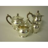 A George V silver four piece circular Tea Service with Celtic frieze, London 1924/5, maker: J.R.