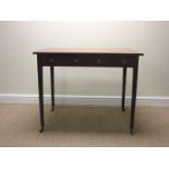 A Regency Side Table with ebonised banding to the top fitted frieze and dummy drawer on square