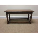 An 18th Century style oak long Joint Stool on turned supports, 3ft