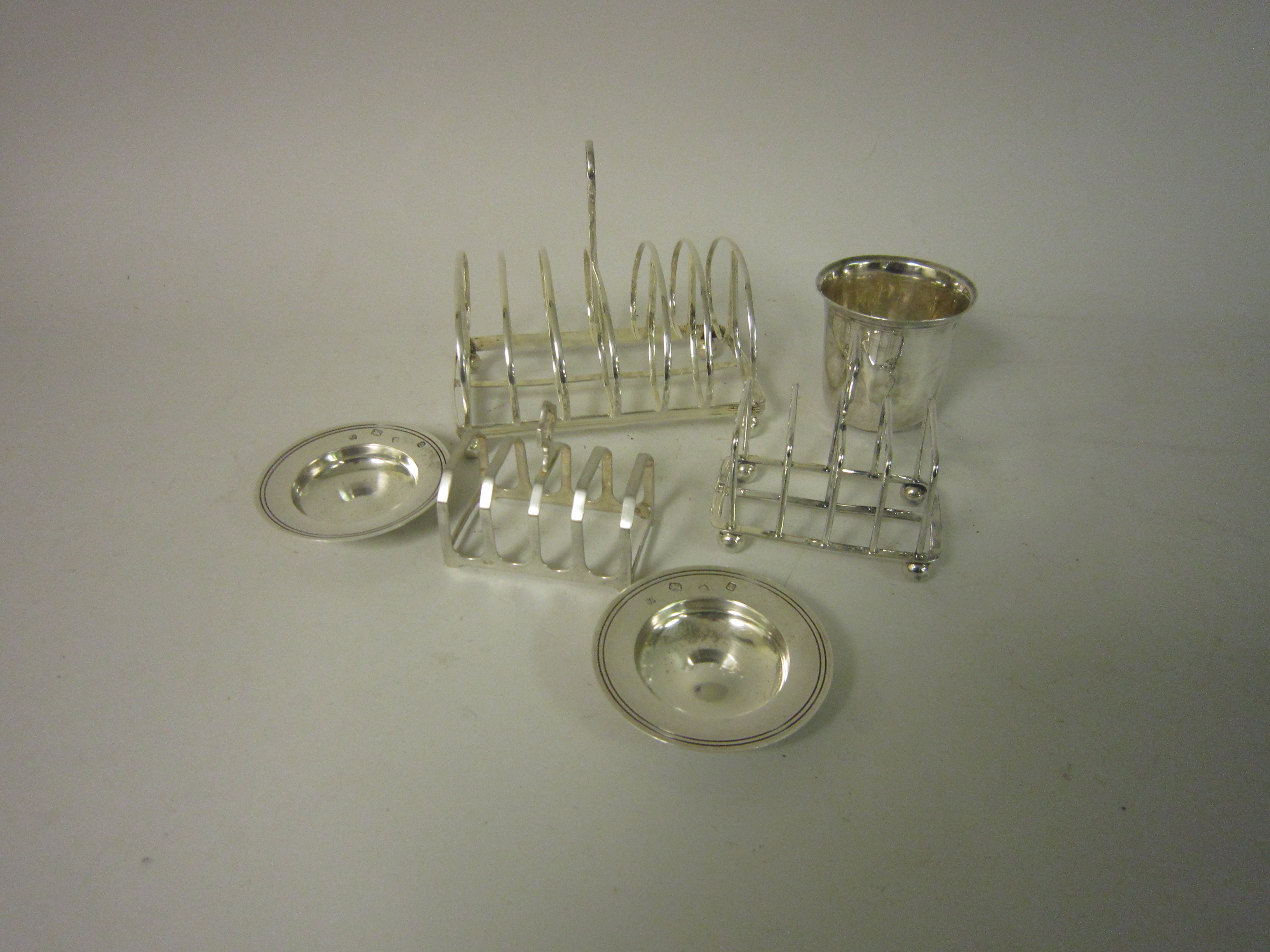 Two small silver Toastracks, Birmingham 1933 and Sheffield 1903, pair of circular Trinket Dishes,