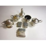 Three silver Vesta Cases, a three piece condiment Set, and two Mustard Pots