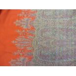 A Paisley patterned Shawl, orange, reds and yellows, colour good, a few tiny holes, 19th Century, 75