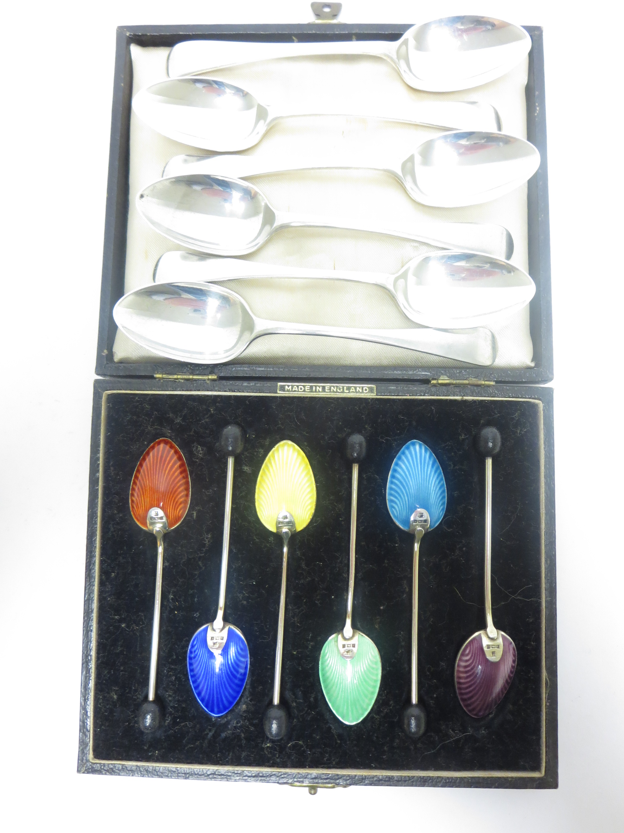Six George VI silver and coloured enamel Coffee Spoons with bead stems, Birmingham 1951, in case and