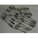 A quantity of silver fiddle pattern Cutlery: 5 Dinner Forks, 2 Dessert Forks, 3 Table Spoons, 4