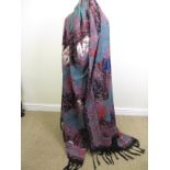 A large twill weave printed Paisley style Shawl, rich colours, some old moth damage in a few