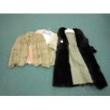 A 1920’s black moleskin Coat with a large collar and brocade lining, a pastel mink Cape and a