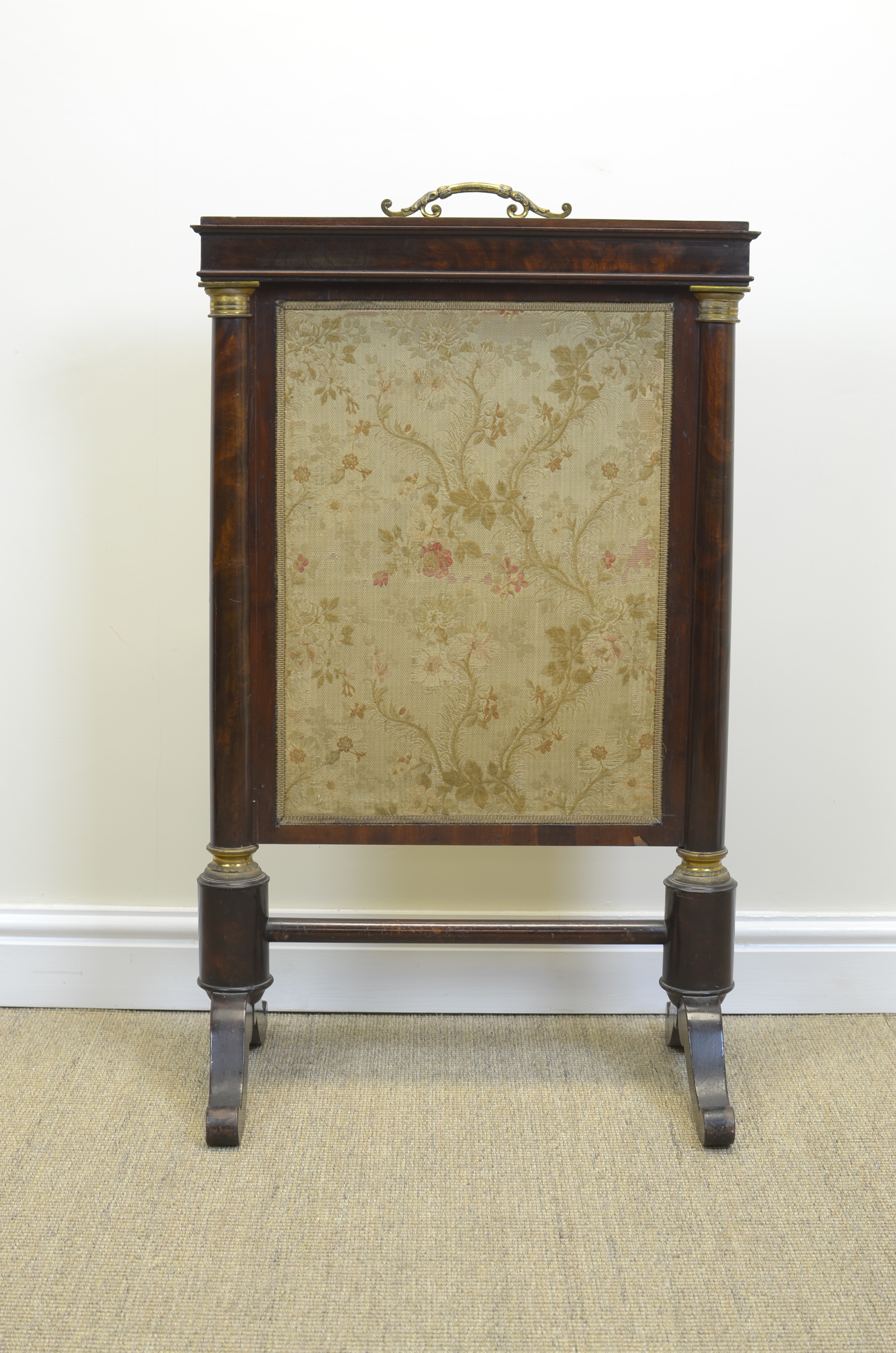 A 19th Century mahogany Firescreen with tapestry panel, brass mounted turned columns and cheval