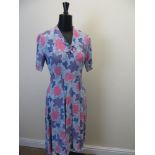 A blue and lilac 1940’s Dress, 30’s Dress with bands of flowers, 40’s red and blue printed Dress and