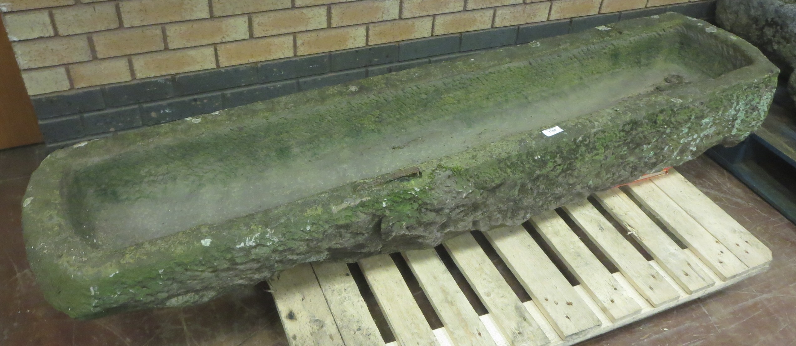 A 19th Century long Stone Trough with rounded ends, approx 6ft 2in x 1ft 4in