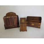 A mahogany and inlaid miniature Bookcase, stamped Asprey verso, 9in H x 8 1/2in W, a mahogany and