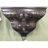 A 19th Century ebonised Bracket inlaid with brass and mother of pearl