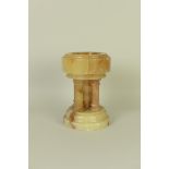 A miniature alabaster Font supported on pillars with circular base, 10 1/2in H