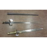 A French 19th Century Hanger Sword with brass hilt and 18 1/2 inch double sided blade, and a