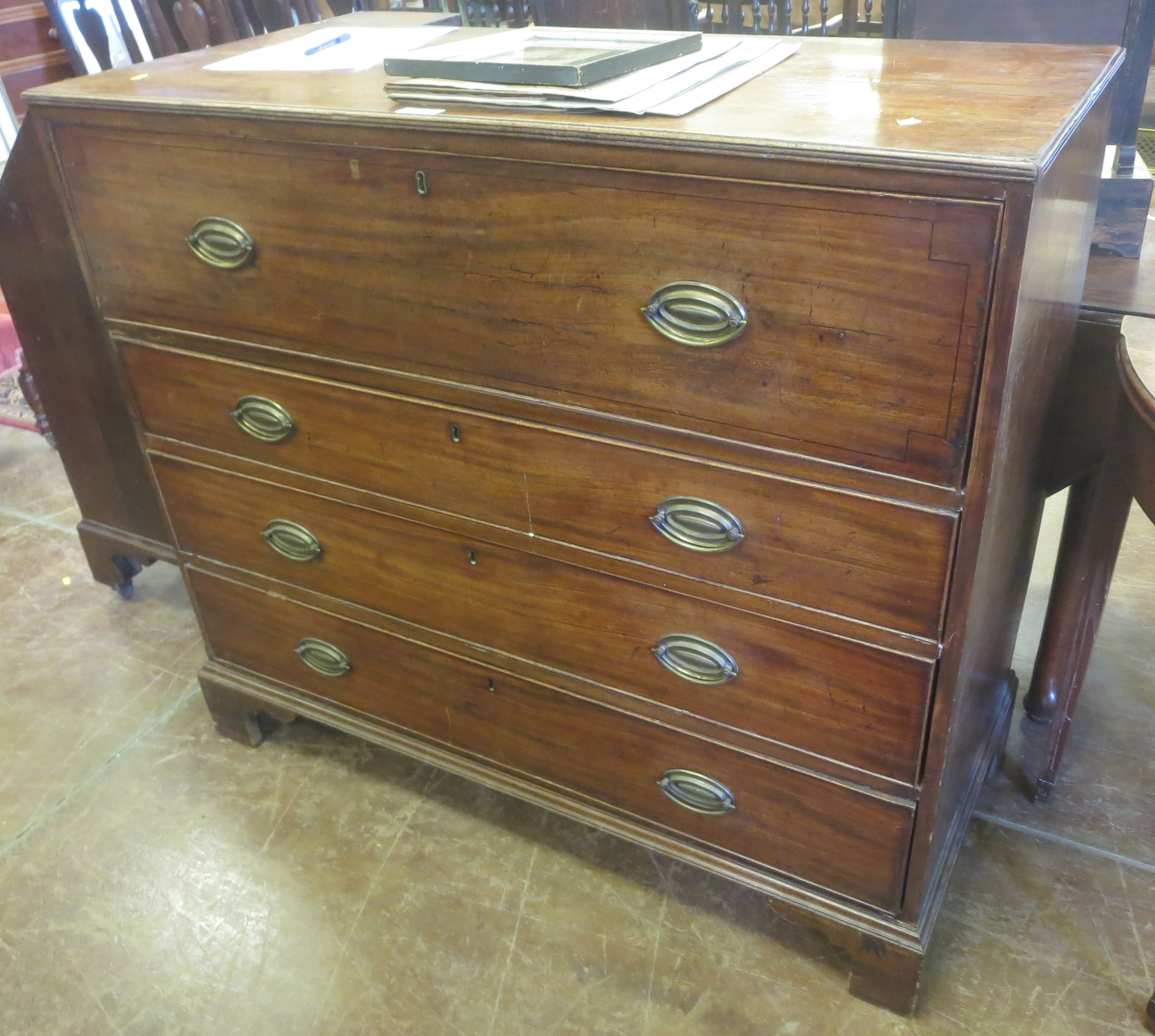 A 19th Century mahogany Secretaire Chest with fitted interior of drawers and compartments above