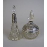 A silver mounted globular cut glass Scent Bottle, London 1905, 6 1/2in H and a silver collared cut