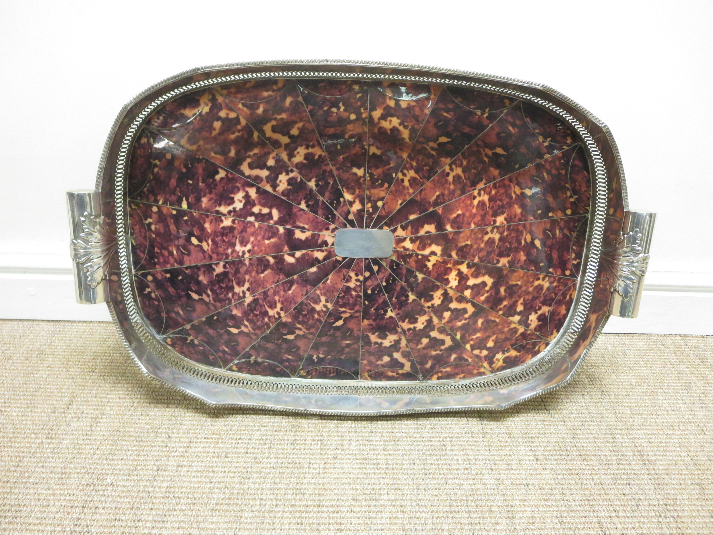 A large plated oblong Tray with pierced gallery, leafage scroll handles with faux tortoiseshell