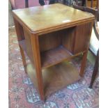 A Heal & Son, London walnut Book Table with quarter veneered top, book shelves and lower tier,