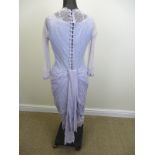 A pale lilac and taffeta Wedding Dress worn by Barbara Windsor as Peggy Mitchell in EastEnders. Sold