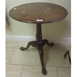 A Georgian mahogany Pillar Table with moulded top on baluster turned column and tripod base, 1ft