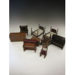 Dolls House Furniture including a pair of beds stamped Germany, medieval style armchair, two pianos,