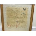 A Japanese silkwork Panel of birds and butterflies amongst bamboo, 20 x 19in, discoloured