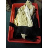 A large box of Victorian Costume including a sash with beaded buckle, black dresses, skirts and
