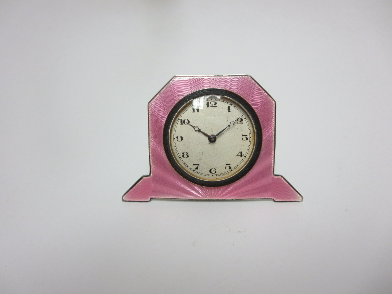 A George V Art Deco silver and pink basse taille enamel Dressing Table Clock, Birmingham 1931