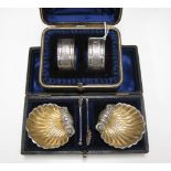 A pair of Victorian silver Shell Salts with matching spoons, London 1894, cased, and a matched