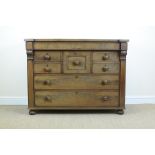A Victorian mahogany Chest with concealed top drawer, two short drawers and two hat drawers, two