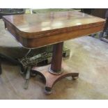 A 19th Century mahogany Card Table with fold-over top on tapering octagonal column and platform