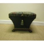 A 19th Century tapestry covered square Ottoman with concave sides mounted on mahogany base and paw