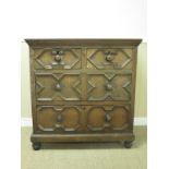 A Jacobean oak Chest of two short and two long drawers with moulded fronts on turned supports, 3ft