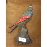 A cast Doorstop in the form of a Cockatoo, painted detail on a rustic stand, 12in H