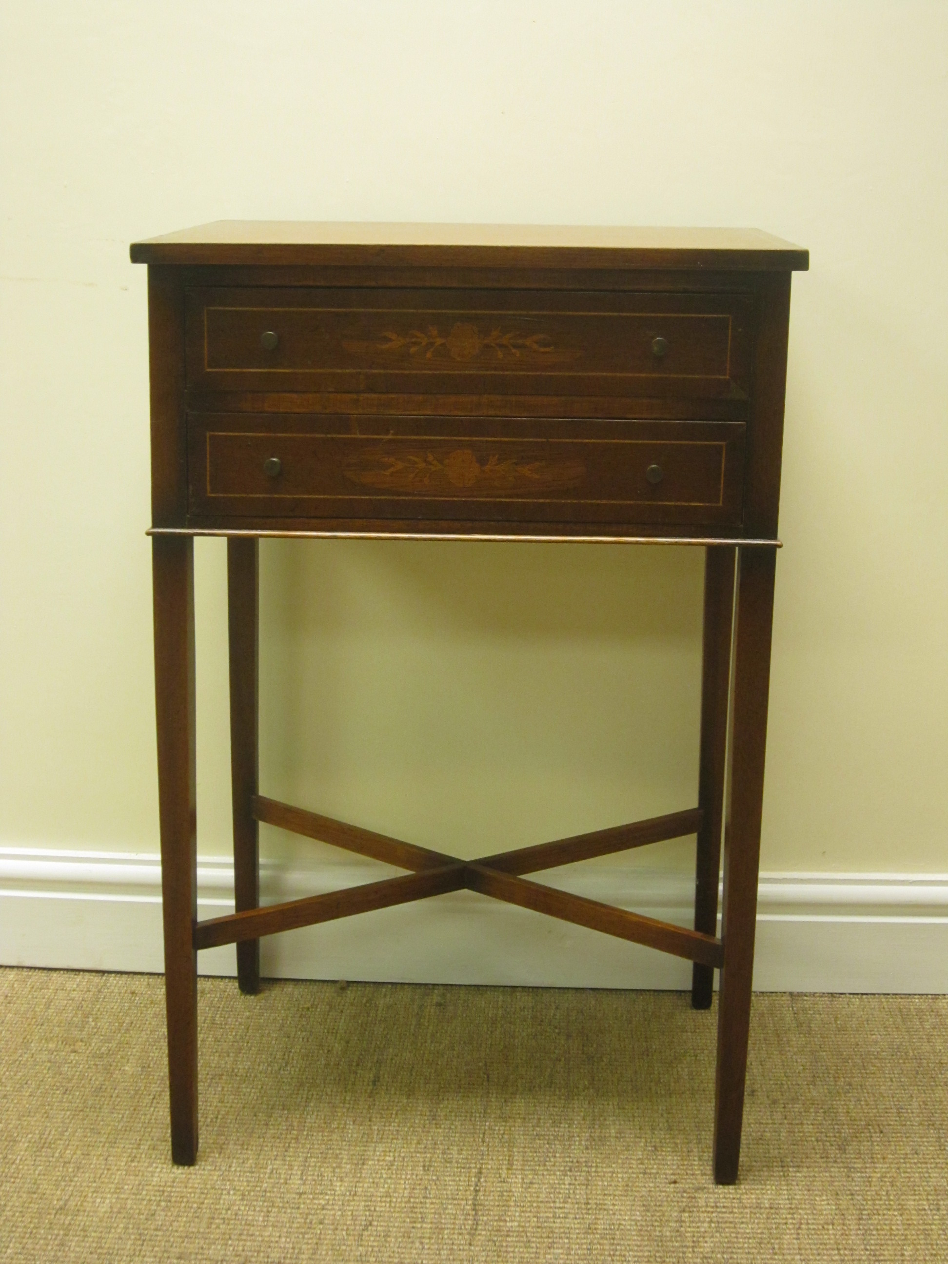 A mahogany and cross-banded two drawer Side Table with satinwood stringing on square tapering