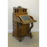 A Victorian burr walnut piano top Davenport with rising top fitted drawers and pigeon holes, pull-