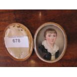 ENGLISH SCHOOL, EARLY 19th CENTURY. Portrait miniature of a Boy, wearing a dark brown jacket and