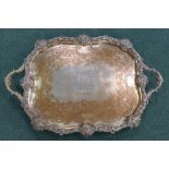 A large old Sheffield plated two handled Tray with floral and scrolled foliate cast border and