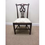 A set of four Georgian mahogany Chippendale style Dining Chairs with shaped top rails, pierced