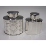 An oval silver Tea Caddy with swagged decoration, Chester 1911, and an Edward VII silver shaped