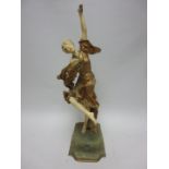 A French Art Deco ivory and gilt metal Figure of female dancer, on onyx base with plaque having