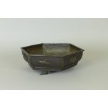 An Oriental bronze Bowl of hexagonal form decorated insects in relief including grasshopper,