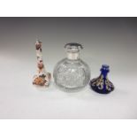 An Edward VII silver lidded Imari pattern Scent Bottle, a blue glass Scent Bottle and a