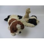 A black and white Merrythought Dog, a Japanese battery powered brown and white dog and a small